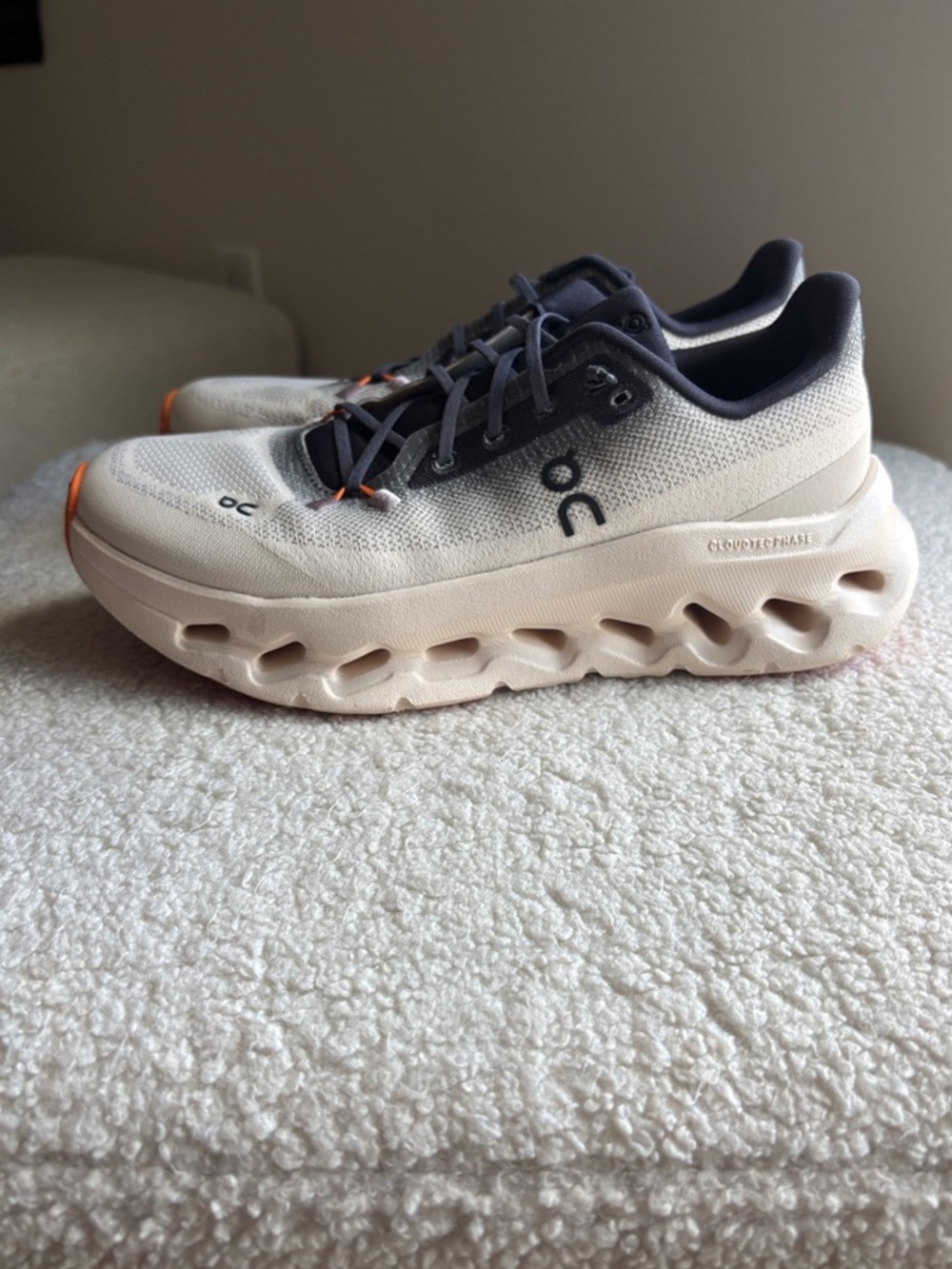 On Running Neutral Cream Sneakers with Orange Accents